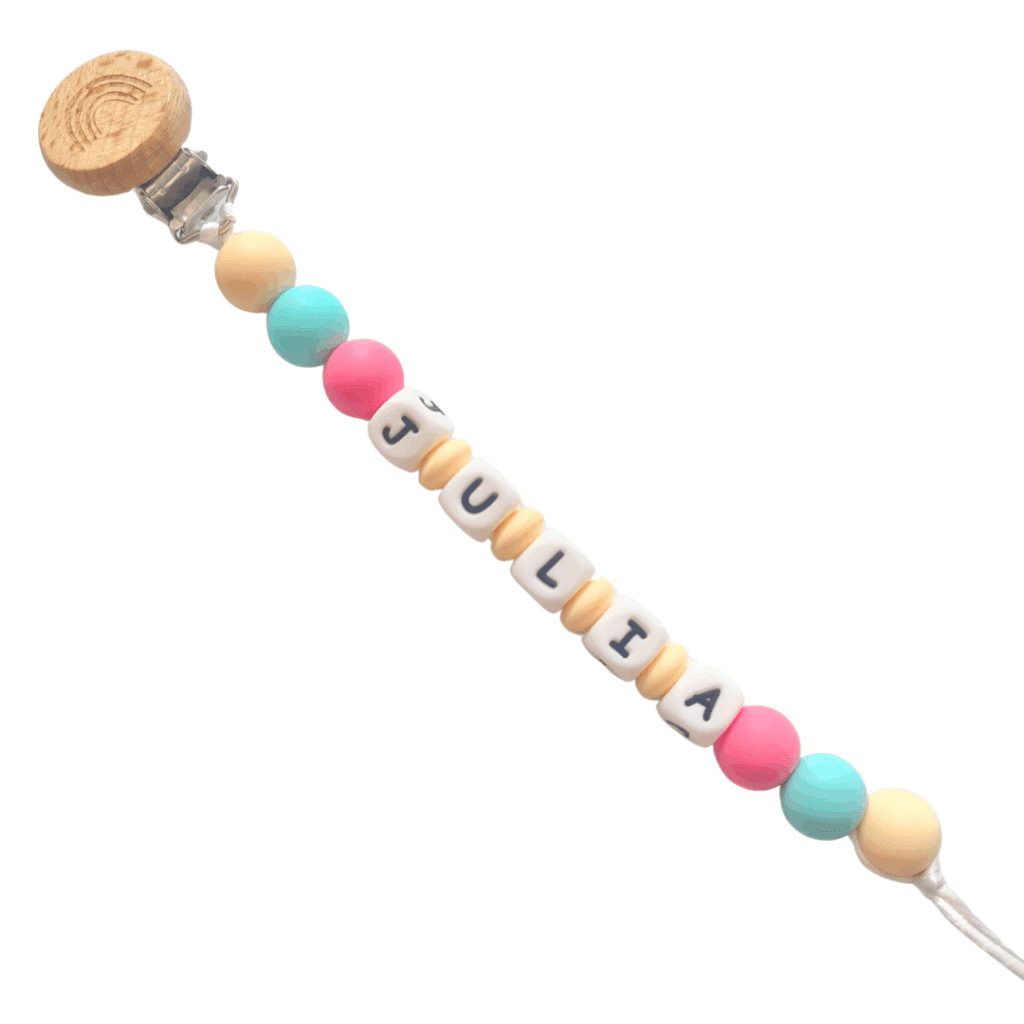 Chupetero personalizado con nombre, elaborado en silicona alimentaria y madera natural para bebés.