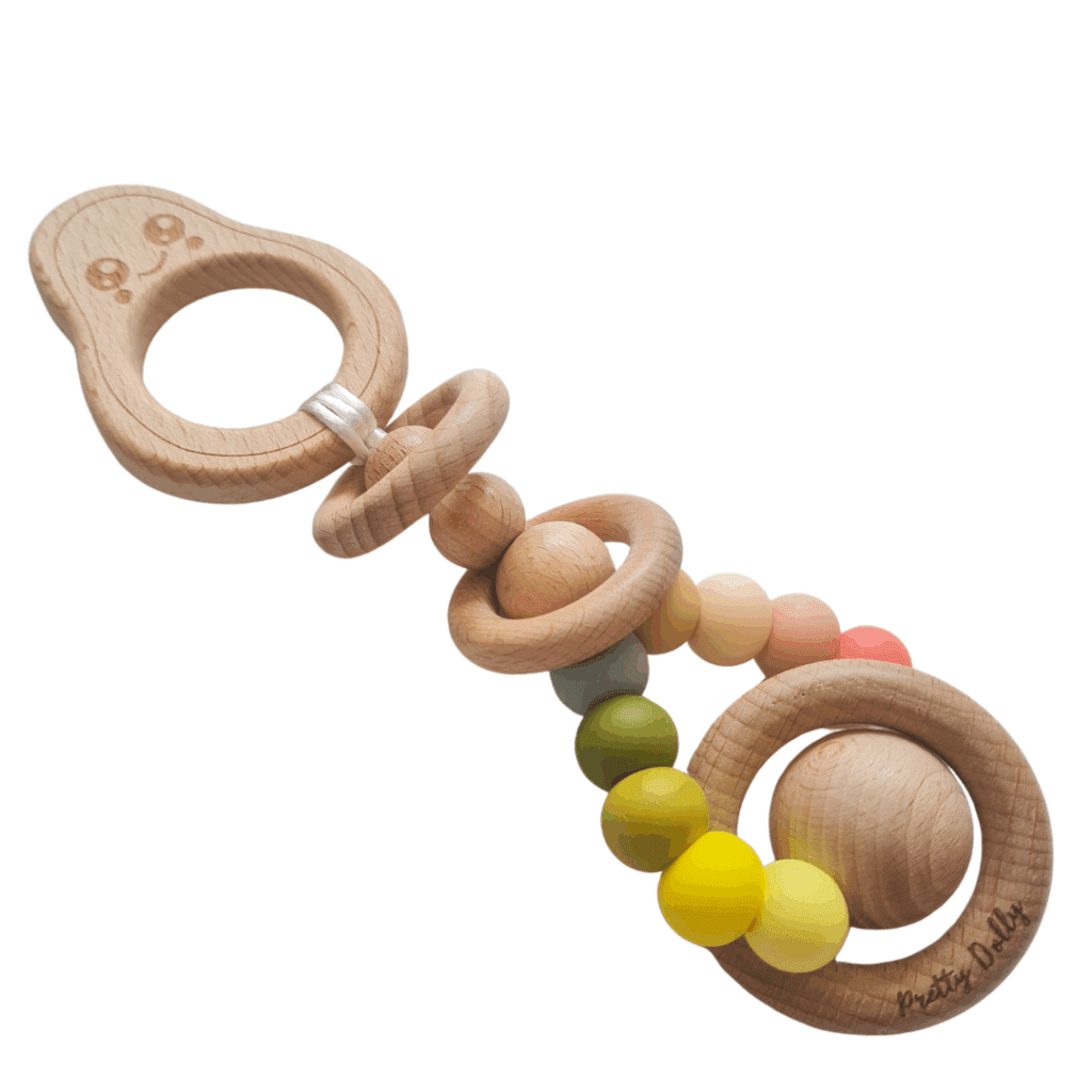 Mordedor sonajero artesanal con doble textura para estimulación sensorial: tacto, sonido y olfato